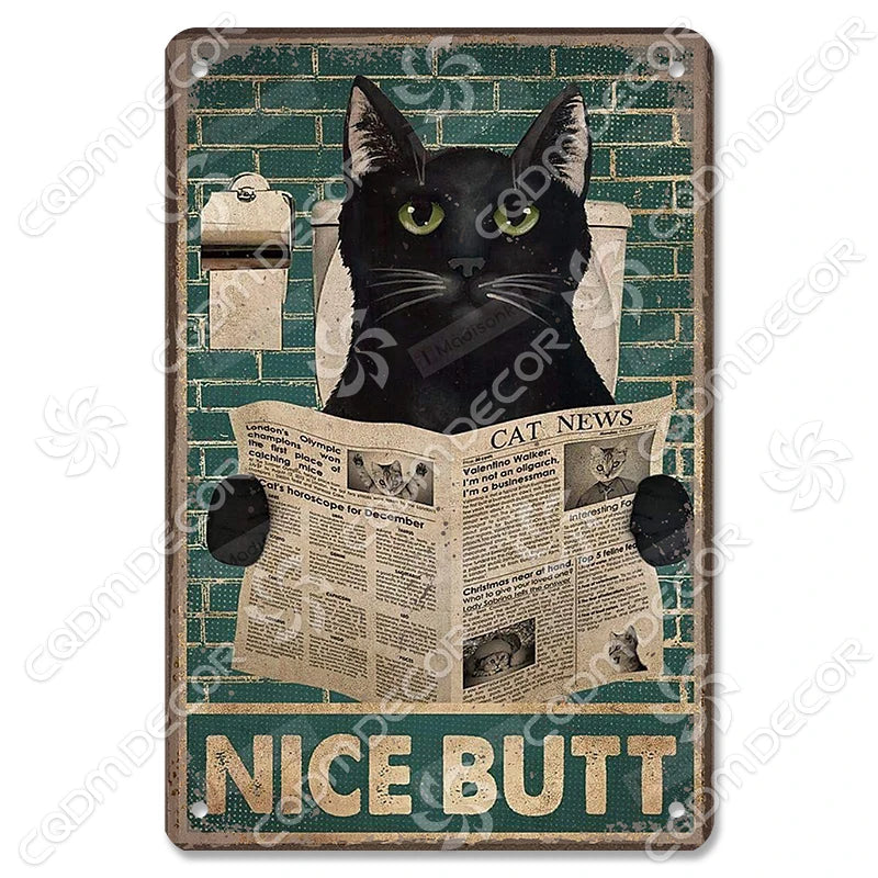 Décor mural vintage en métal d'un chat noir aux yeux verts regardant directement l'observateur.