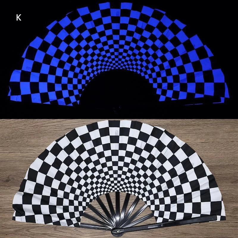 A black and white checkered folding fan is shown in an arc, with a UV fluorescent pattern visible.