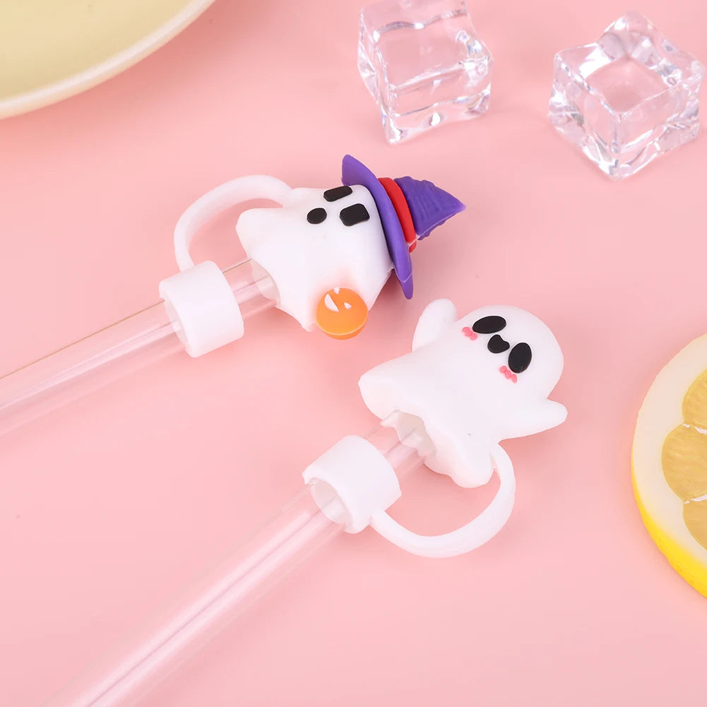 White silicone straw covers with purple accents and clear ice cubes on a pink background