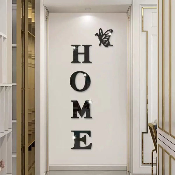 A decorative wall sticker featuring the word HOME in black lettering with a butterfly silhouette above it.