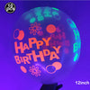 A translucent latex balloon filled with neon glow-in-the-dark paint displaying the text Happy Birthday