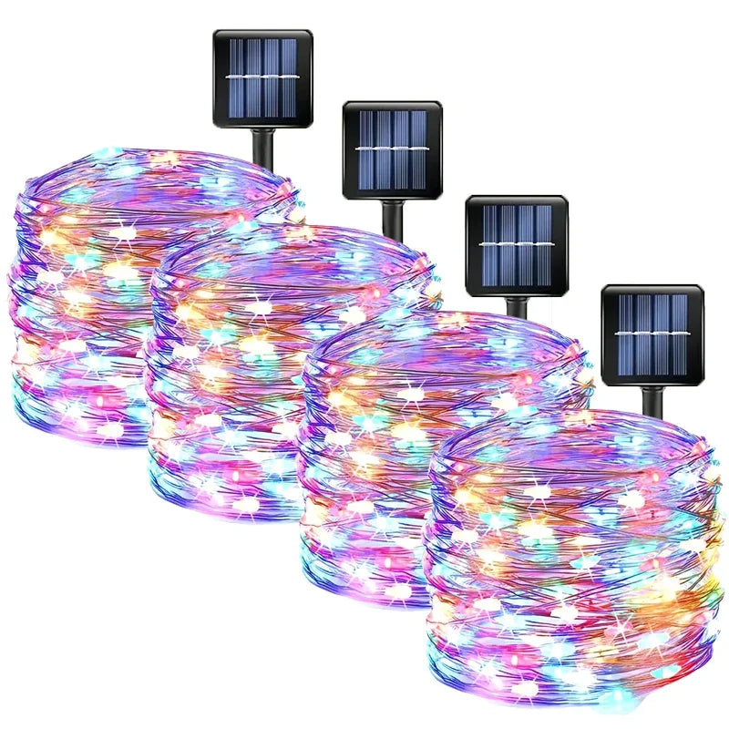String of colorful fairy lights with solar panels for outdoor garden décor