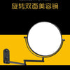 A round mirror with a black frame and telescopic arms is shown against a yellow background.