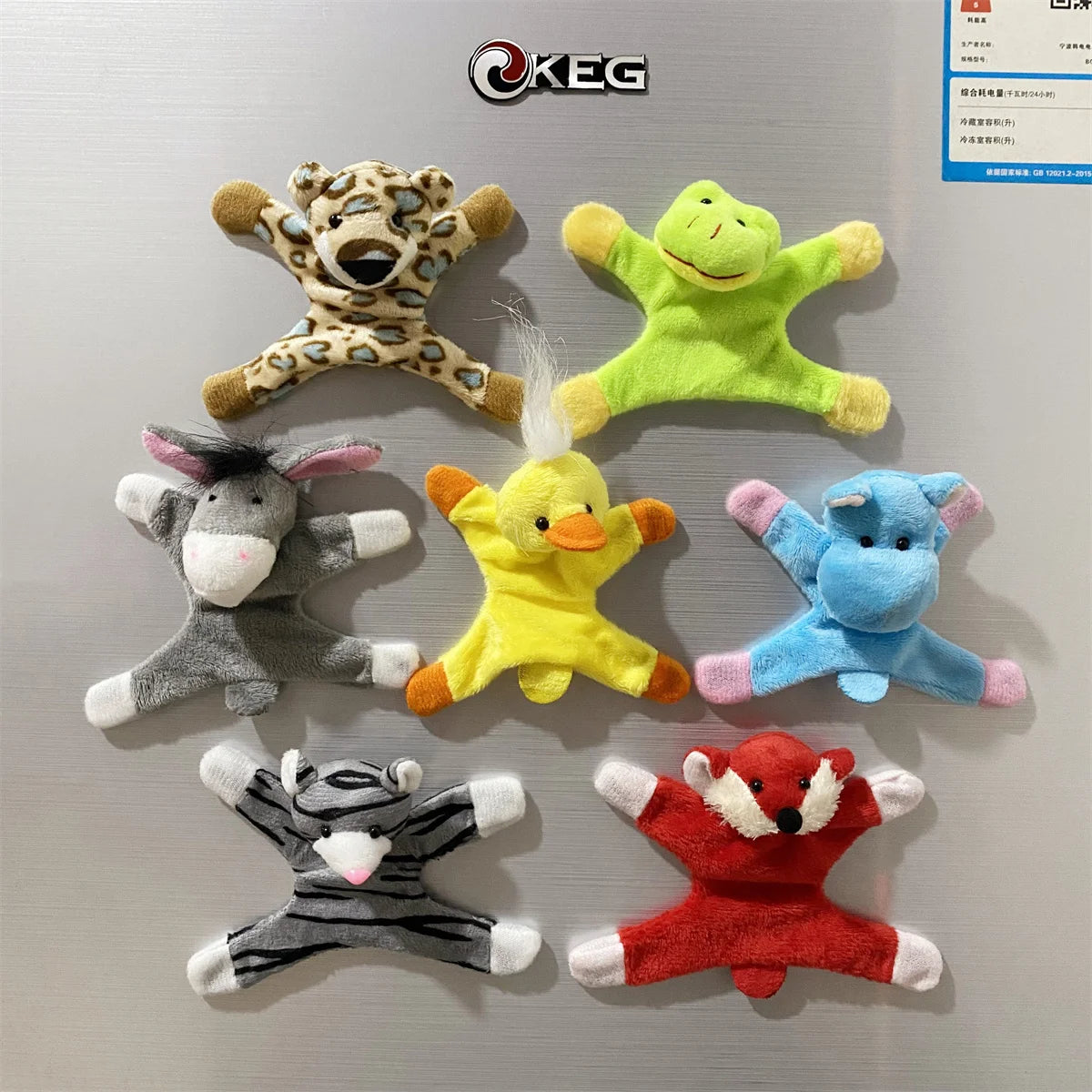 A collection of fridge magnets featuring cute animal designs including an elephant, donkey, duck, blue elephant, and red fox.
