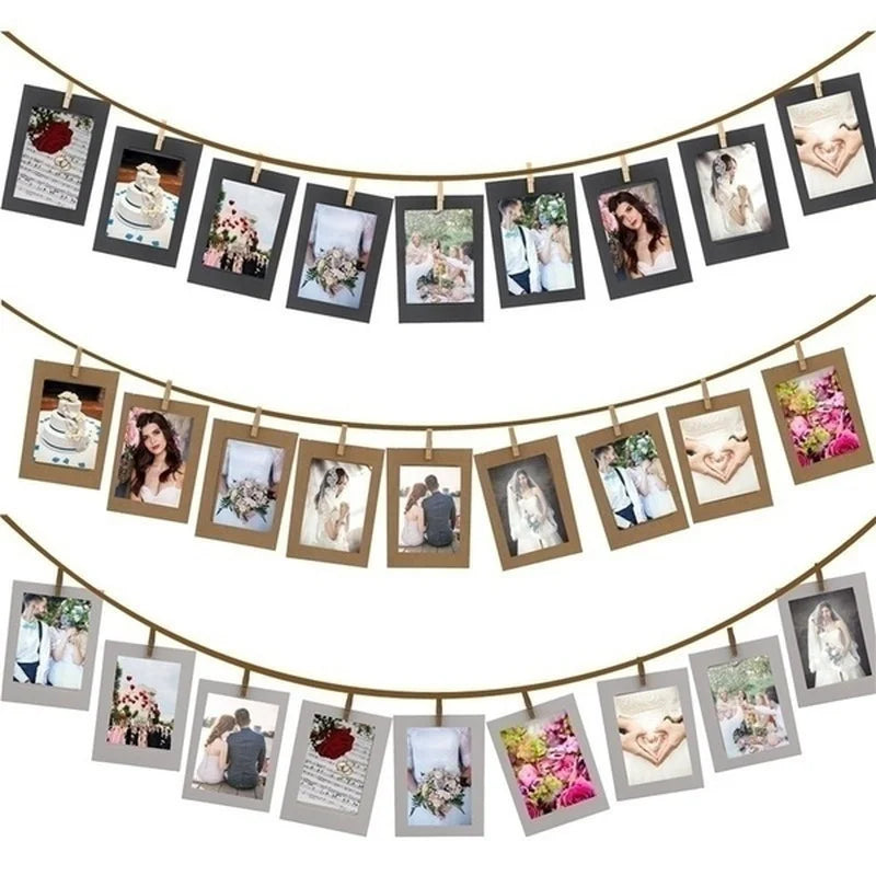 A decorative garland of rustic wooden clip photo display set with kraft paper frames.