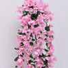 A cascading arrangement of pink faux bougainvillea vine flowers on a dark green stem.