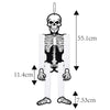 A set of Halloween hanging ornaments featuring ghosts, pumpkins, and skeletons.