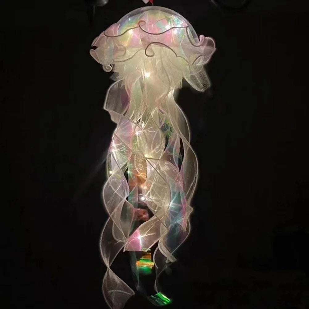 A translucent jellyfish lantern lamp with iridescent, flowing light patterns hanging against a dark background.