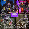 A collection of Halloween decorations featuring giant spider webs and a large black spider against various backgrounds.