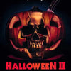 Halloween II poster featuring a carved pumpkin skull and a knife against a dark background
