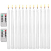 A set of white flameless LED taper candles with a remote timer shown in a row.