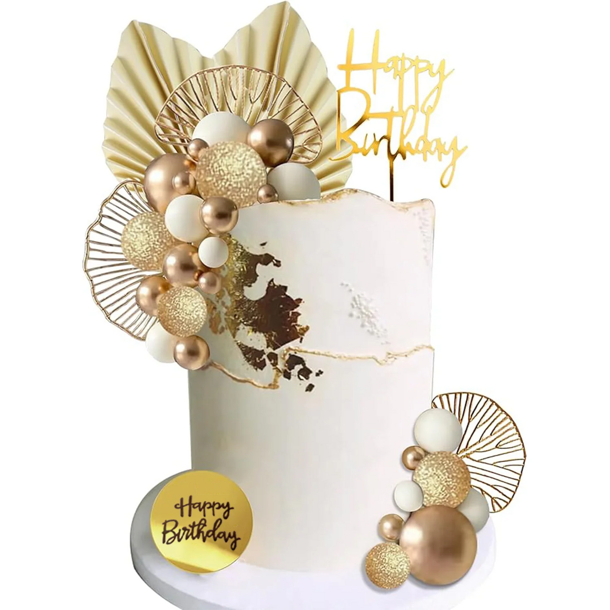 A white cake decorated with gold and champagne-colored spherical toppers and a gold birthday banner.