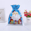 Blue drawstring gift bags featuring Santa and snowman designs with festive patterns