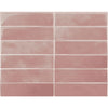 Rectangular pink ceramic tiles arranged in a grid pattern for a backsplash