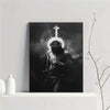 Black and white canvas art print depicting a figure with a crown and halo holding a cross.