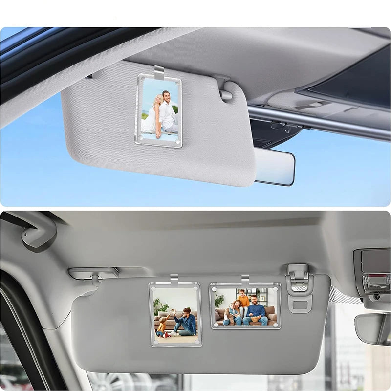 Three clear photo clips mounted on a car visor for interior decoration