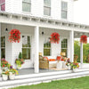 Two hanging decor sets featuring artificial morning glory flowers and eucalyptus greenery displayed on a porch.