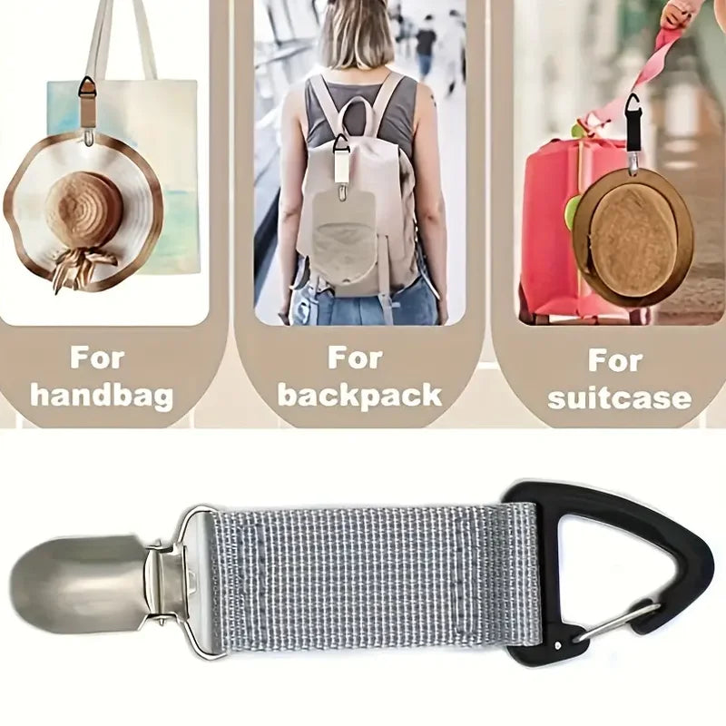 Silver strap clip for hats and accessories used to secure items on bags and luggage