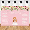 A pink and green floral backdrop for a First Communion celebration featuring a smiling girl