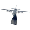 A 1:200 scale diecast model of a C-130 Hercules aircraft with four turboprop engines displayed on a stand.