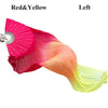A silk ribbon dance fan showing a gradient color transition from red and yellow on the left to light yellow on the right.