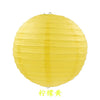 A round yellow paper lantern used for parties and weddings.