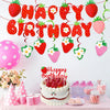 A strawberry birthday party decoration set featuring a banner, cake toppers, and pink and red elements.