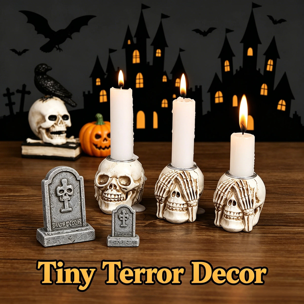 A set of resin skull candle holders with lit candles in front of a spooky castle silhouette.