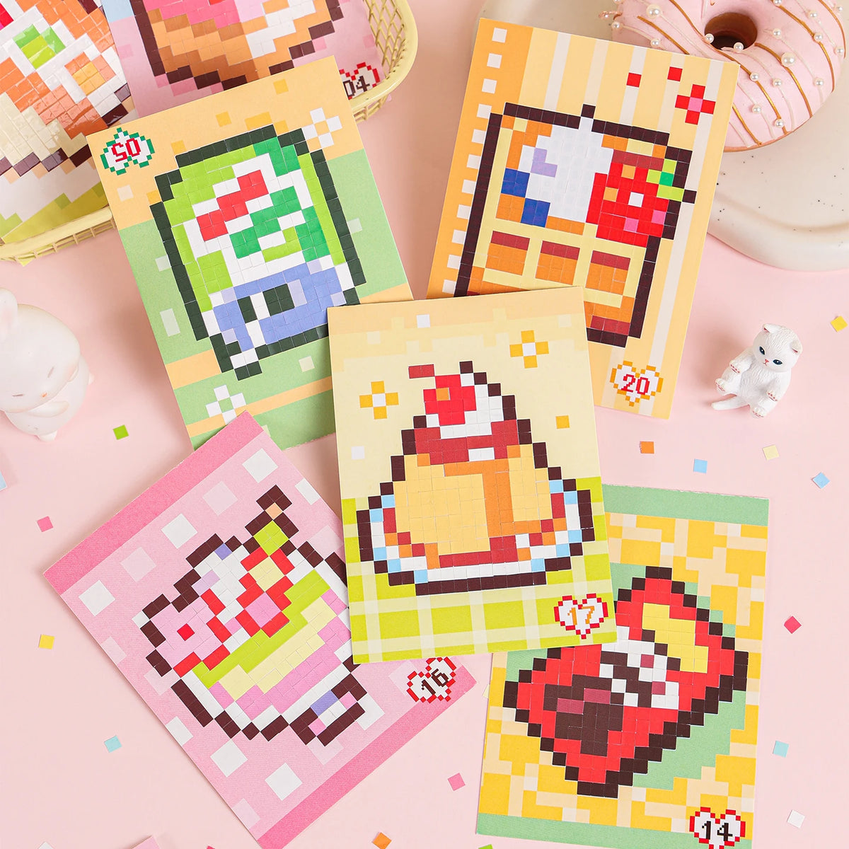 A collection of colorful pixel art die cut stickers featuring cartoon characters and designs on pink and light background pap