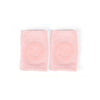 A pair of pink knitted knee pads designed for crawling infants.