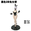 A black 2B female figure collectible statue with white hair and black outfit.
