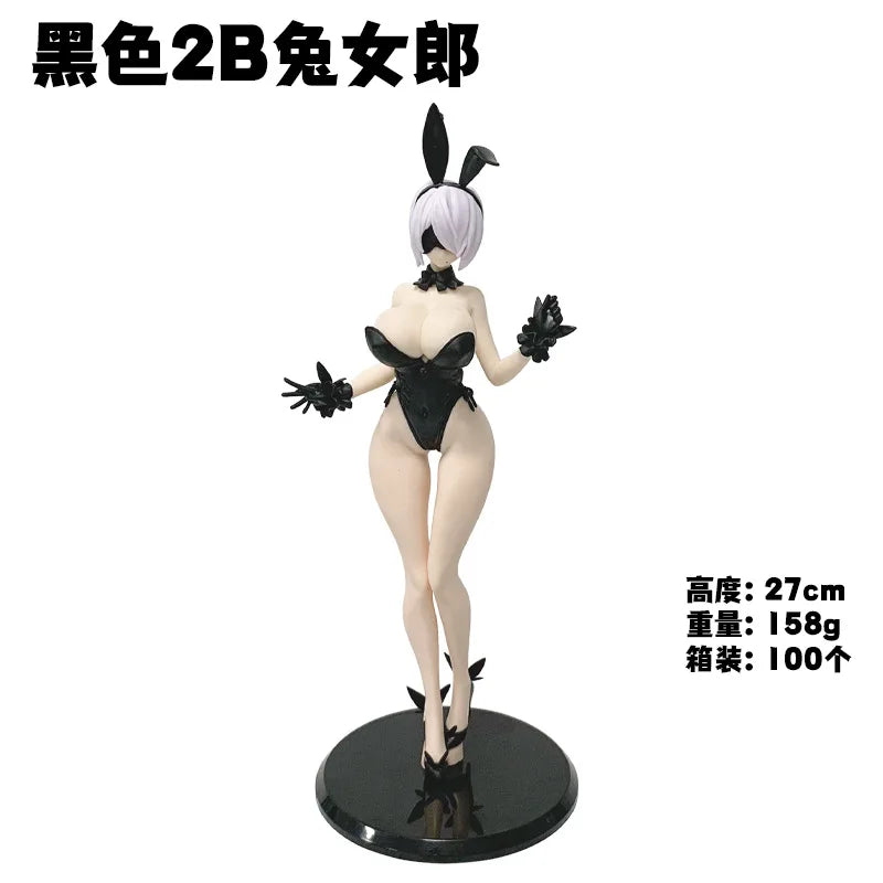 A black 2B female figure collectible statue with white hair and black outfit.