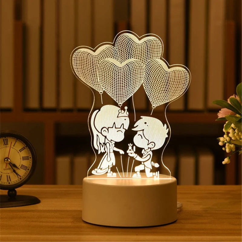 A clear acrylic night light featuring heart-shaped cutouts and a cartoon character design.