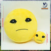 A yellow plush doll resembling a distressed face, shown in two sizes.