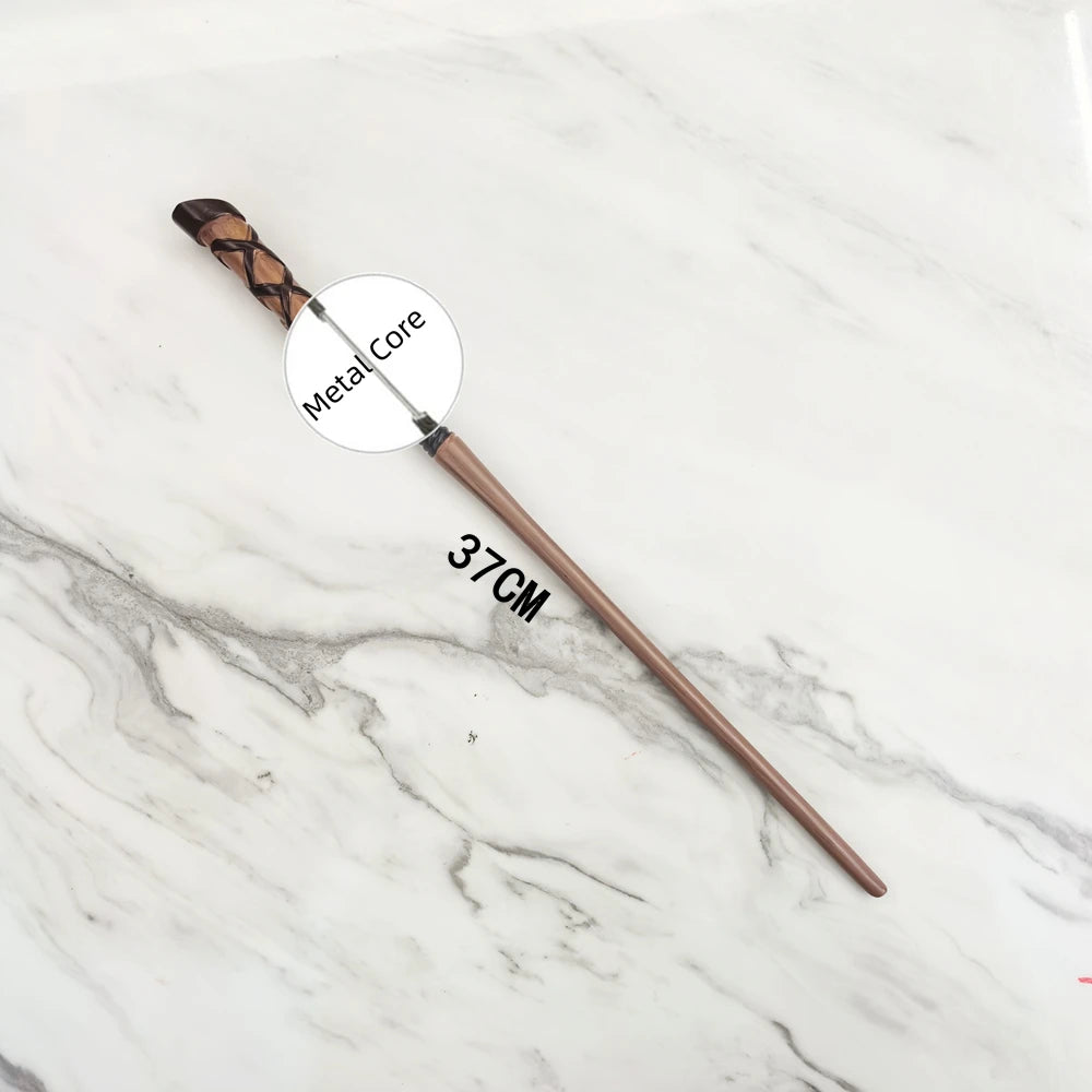 A brown metal magic wand replica with a decorative handle and a 37cm shaft resting on a white marble surface.