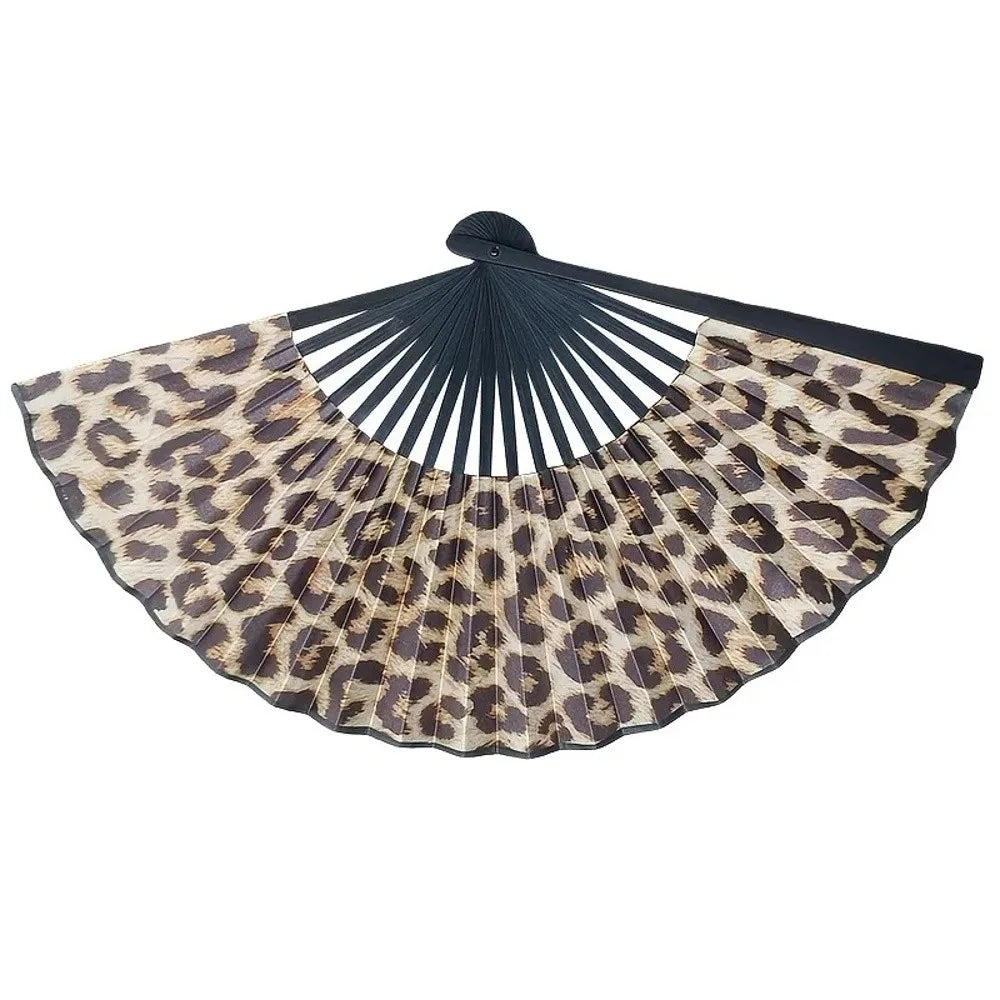 A folding hand fan with a leopard print design in shades of brown and black.