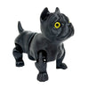 A black 3D printed articulated bulldog figurine with bright yellow eyes.