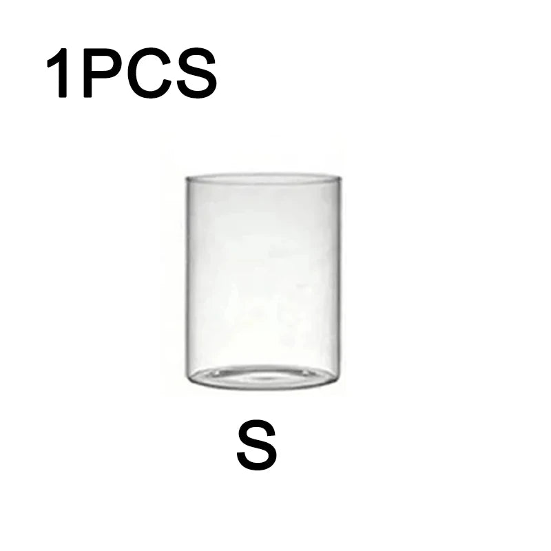 One clear glass candle holder with a versatile vase design.
