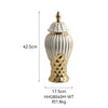 Handcrafted ceramic decorative vase in white and gold with a lid