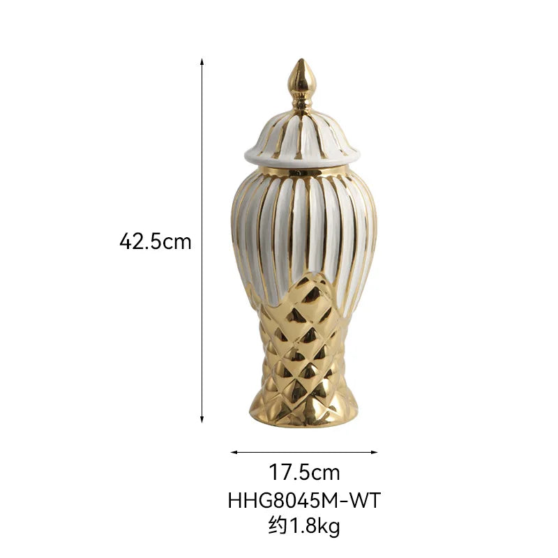Handcrafted ceramic decorative vase in white and gold with a lid