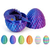 A purple snake fidget toy is displayed in a bowl next to several colorful, textured eggs.