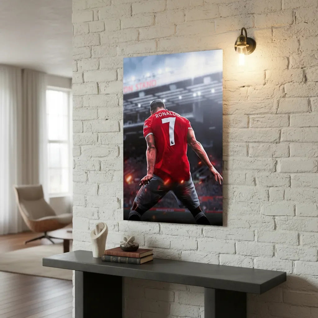 A canvas wall art poster featuring Cristiano Ronaldo in a red jersey, displayed on a white brick wall.