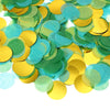 A pile of round tissue paper confetti dots in shades of green and yellow-green.