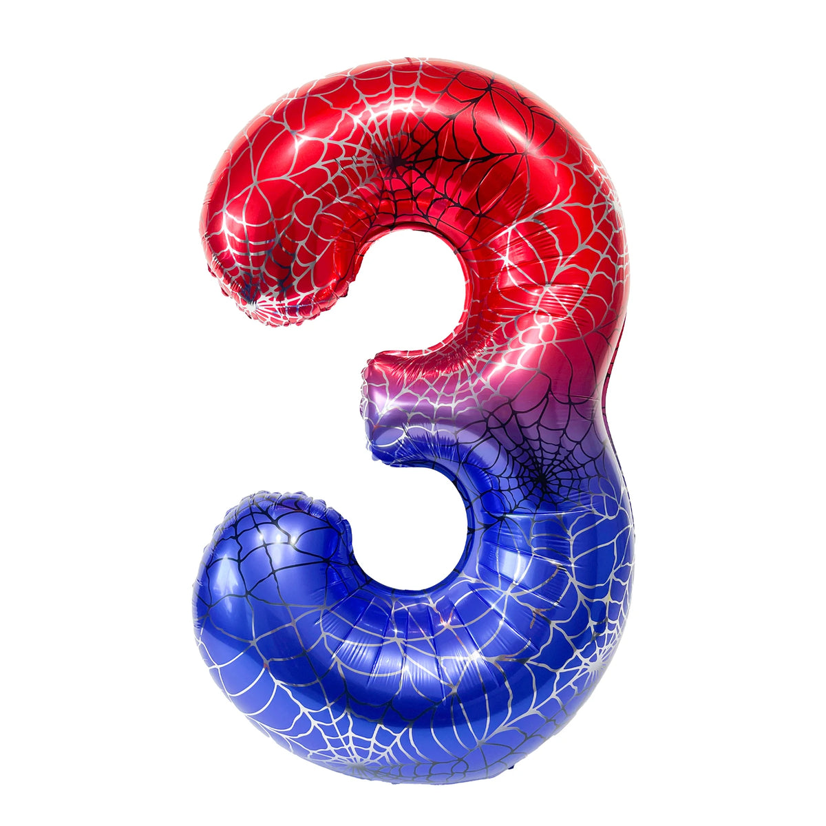 A foil balloon shaped like the number three with a red and blue spiderweb pattern.