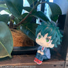 Chibi collectible figure of Izuku Midoriya from My Hero Academia, sitting in a potted plant.