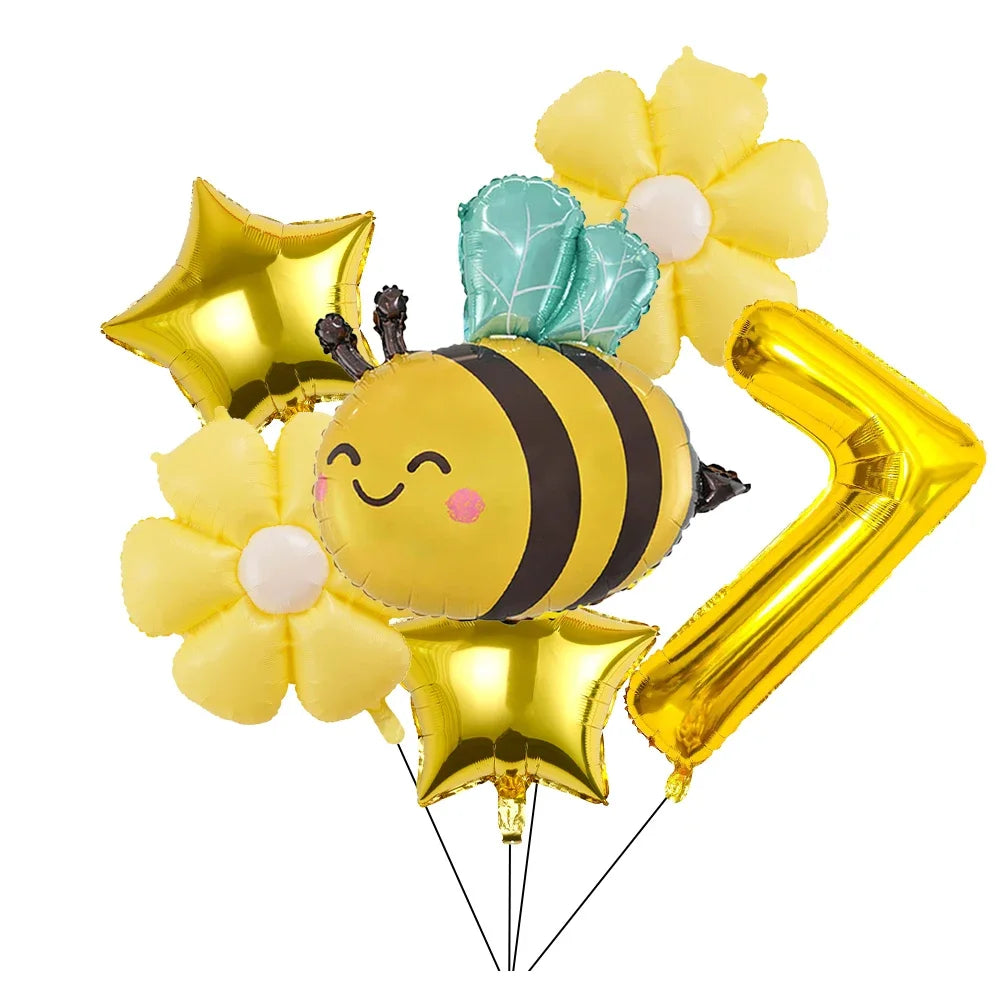 A set of six yellow and gold aluminum foil daisy balloons shaped like a bee and stars for parties