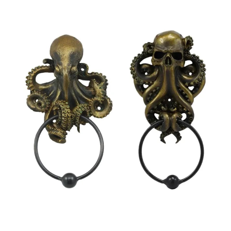 Bronze cast iron octopus skull door knocker with a circular ring.