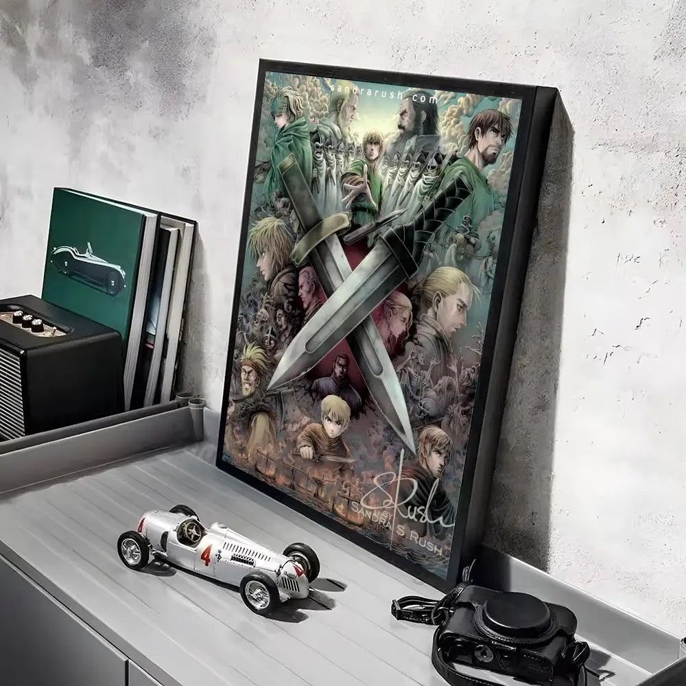 A framed poster of Vinland Saga featuring swords and characters, displayed on a shelf next to a vintage car model.