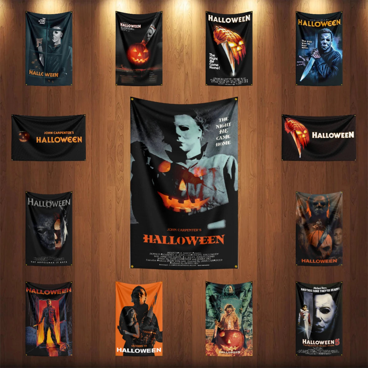 A collection of wall flags featuring various horror movie characters and Halloween themes, including Michael Myers and other 