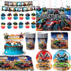 Monster truck birthday party decoration kit featuring a backdrop, tableware, and various themed elements.